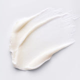 Smooth, creamy texture of Triple-Action Exfoliator by MK Aesthetics for glowing skin.