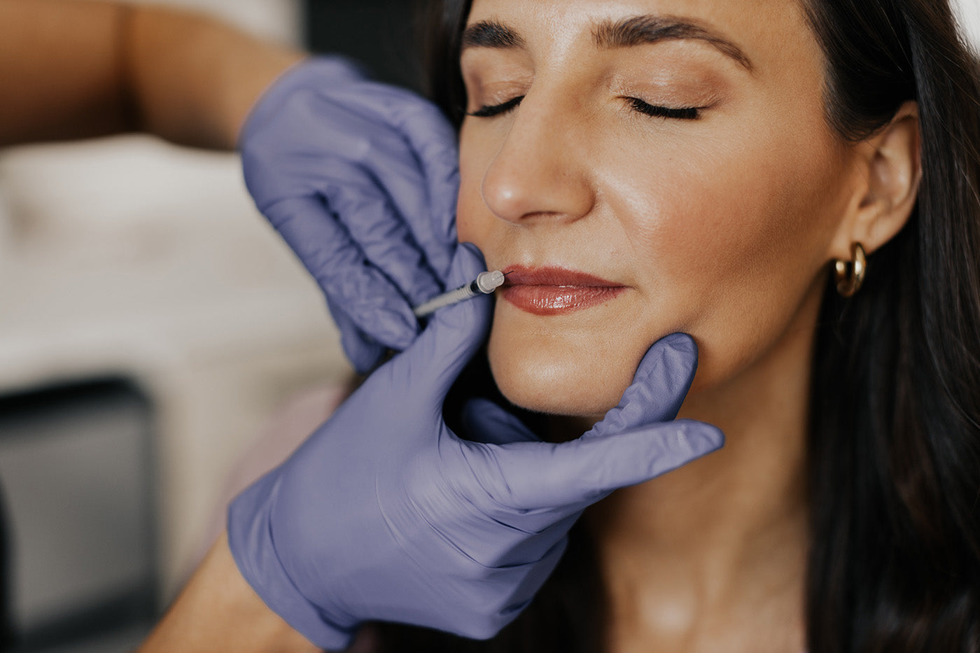 MK Aesthetics medical spa treatment in Minnetonka, client receiving lip enhancement procedure.