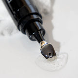 Revox™ Line Relaxer 1 fl oz serum nozzle dispensing product for anti-aging benefits at MK Aesthetics.