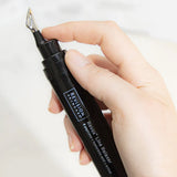 Close-up of Revox™ Line Relaxer 1 fl oz serum applicator for targeted wrinkle treatment.