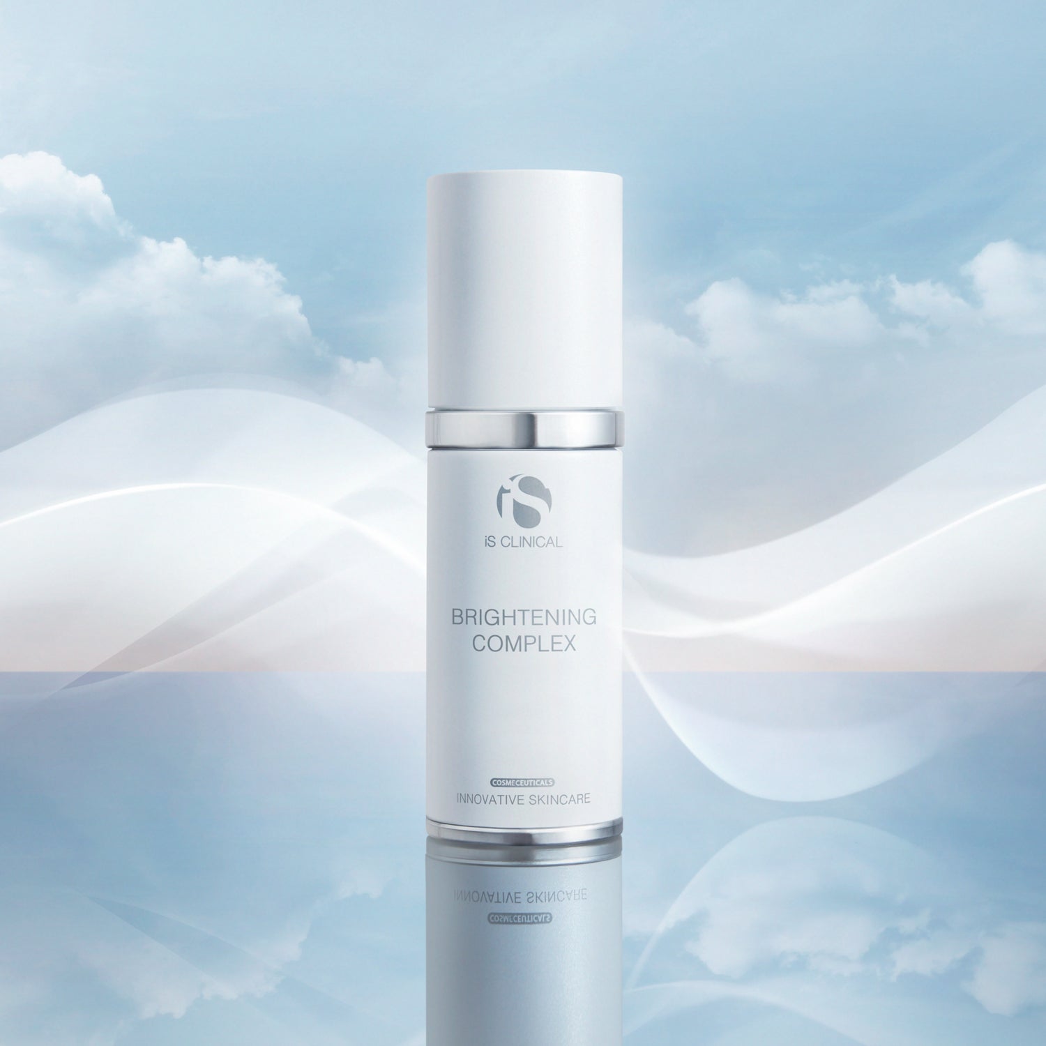 Brightening Complex skincare product by IS Clinical against a serene sky background, promoting brightening and hydrating benefits.