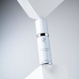 Brightening Complex serum by iS Clinical on a minimalist background, highlighting innovative skincare.