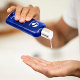 Cleansing Complex being dispensed onto a hand, showcasing MK Aesthetics skincare line at Aesthetics Spa.