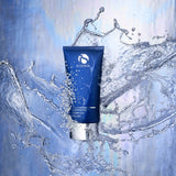 Cleansing Complex Polish by IS Clinical, a deep-cleansing gel surrounded by splashing water.