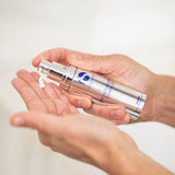 Moisturizing Complex by MK Aesthetics being dispensed into a hand for hydration at Aesthetics Spa.