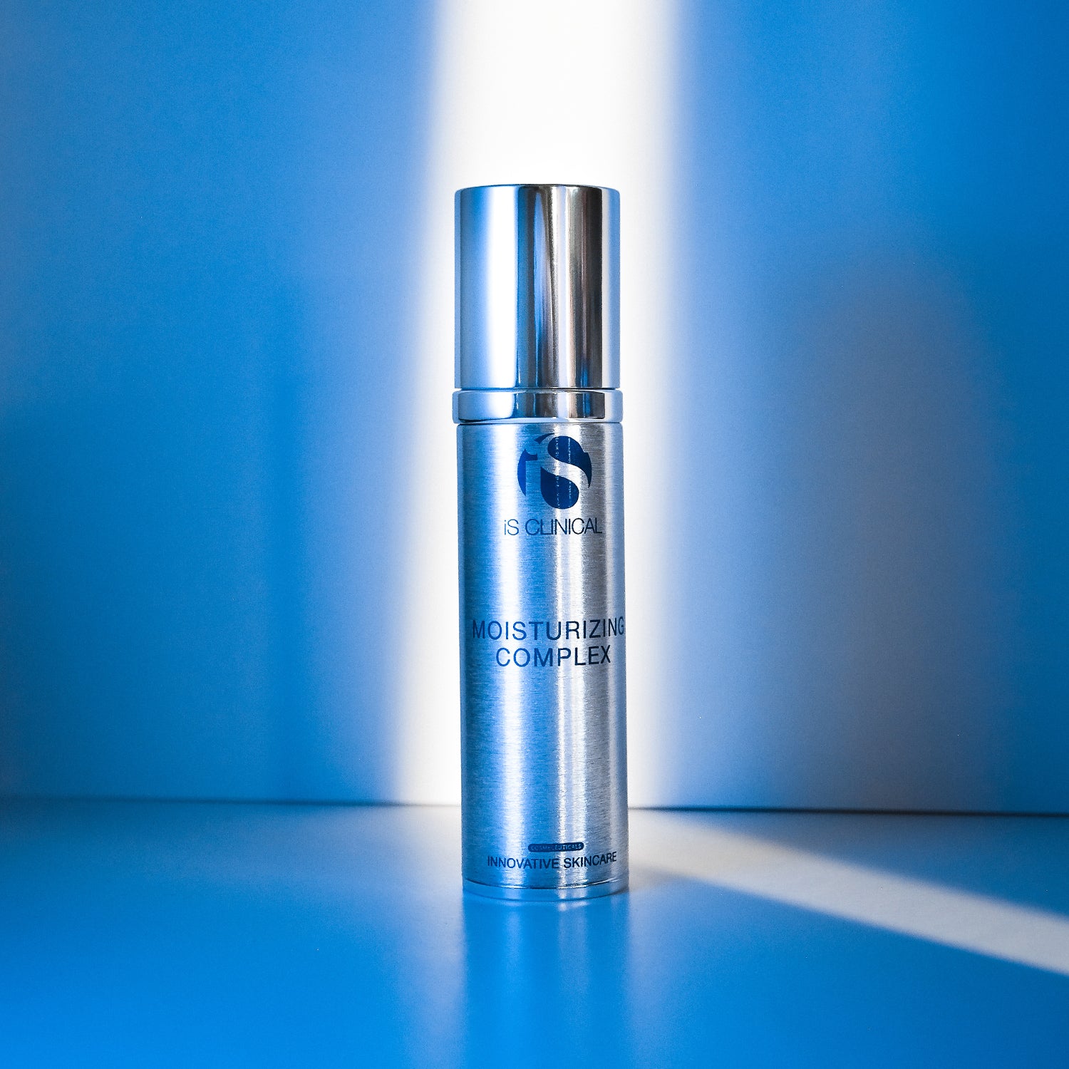 Moisturizing Complex by iS Clinical in a sleek silver bottle, ideal for hydrating skin, from MK Aesthetics.