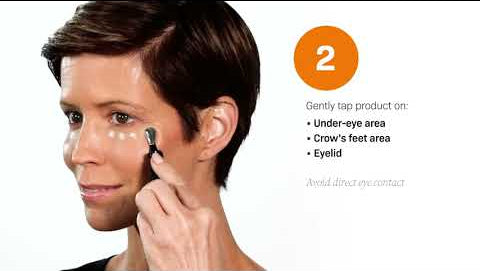 Woman applying D·E·J Eye Cream® 0.5 fl oz gently to under-eye and eyelid area.