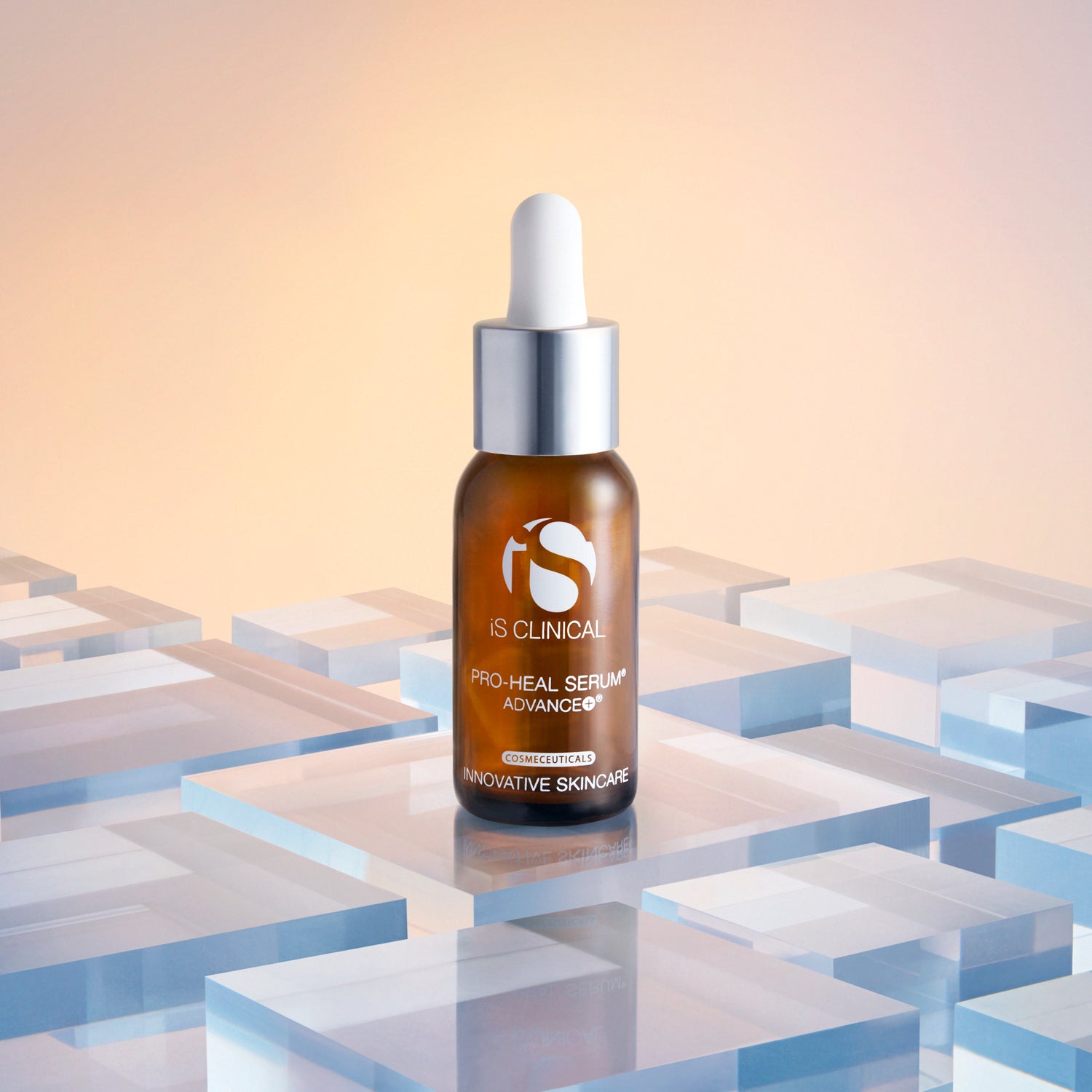 Pro-Heal Serum Advance+ by iS Clinical on acrylic surface, promoting restorative skincare for MK Aesthetics and Aesthetics Spa.