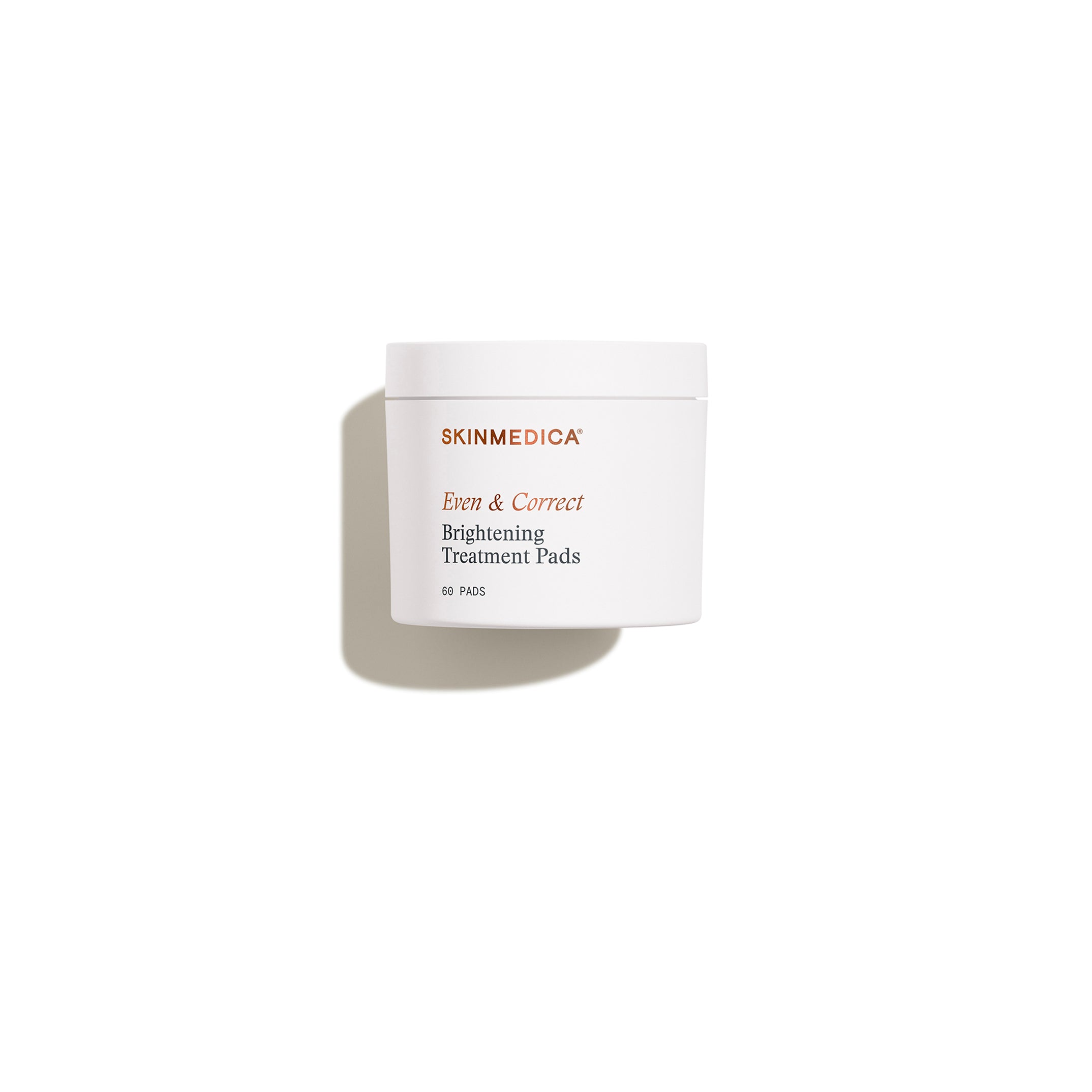 SkinMedica Even & Correct Brightening Treatment Pads in a white 60-pad jar, alcohol-free exfoliating pads for brighter, more even skin tone