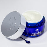 Youth Intensive Crème 1.7oz in a blue jar with silver lid and spatula, showcased for hydration and firming.