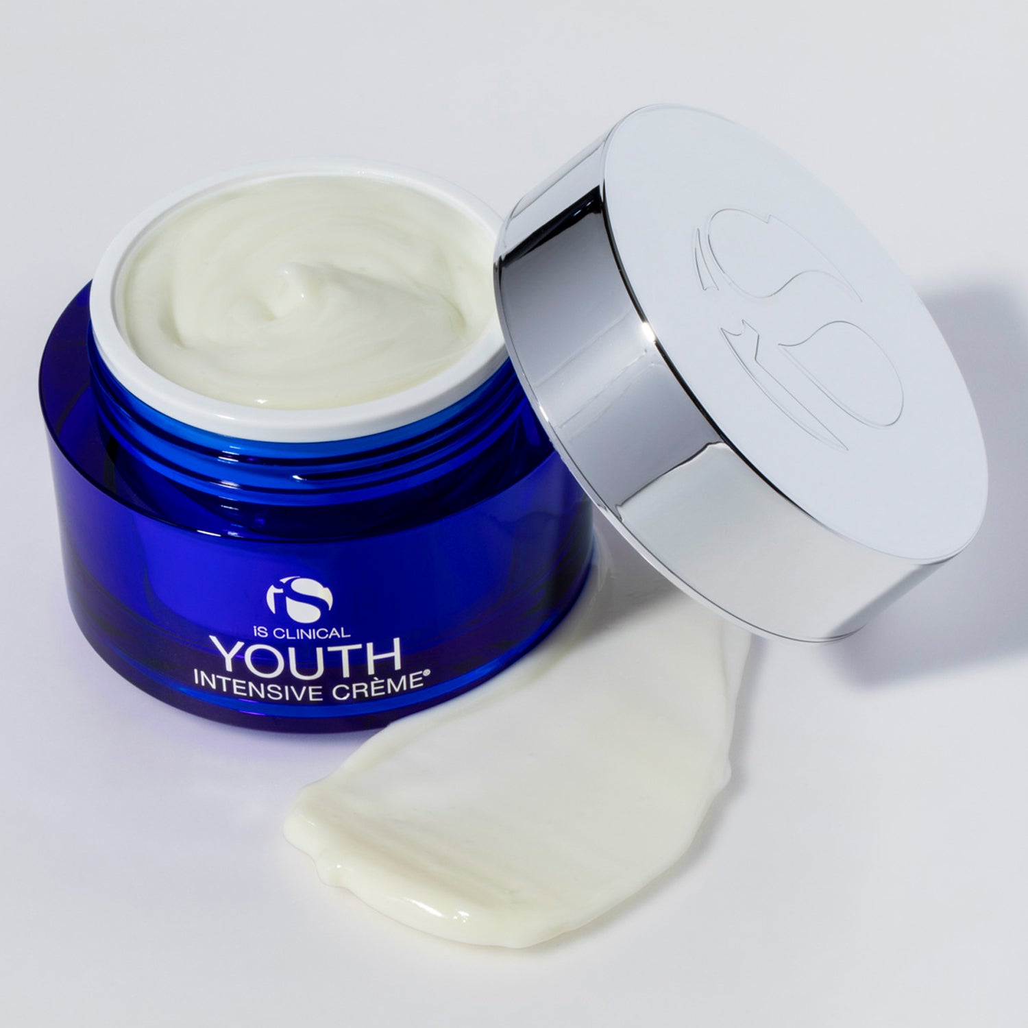 Youth Intensive Crème 1.7oz in a blue jar with a silver lid, showcasing luxurious skincare for age-defying results.